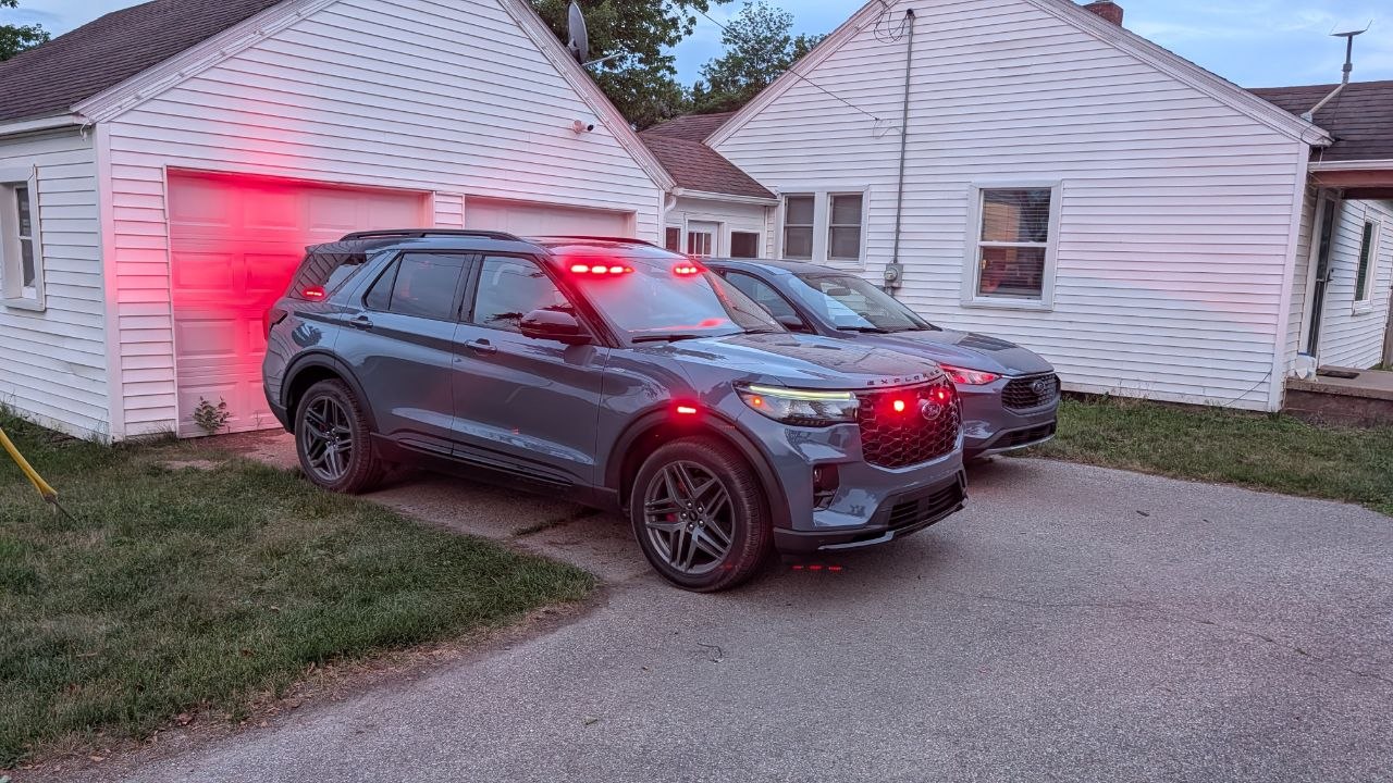 Ford Explorer upfitted by Fera Comm with red emergency warning lighting illuminated